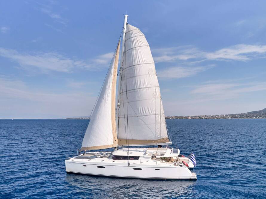 WORLD’S END exterior view during a luxury catamaran rental Greece holiday.